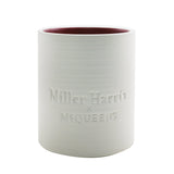Miller Harris Petal Storm Candle: a 250g luxury candle with uplifting citrus and floral aromas for a serene ambiance.
