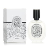 Diptyque Eau Capitale Hair Mist in a 30ml bottle, a luxurious fragrance mist enriched with camellia oil for beautiful, scented hair.