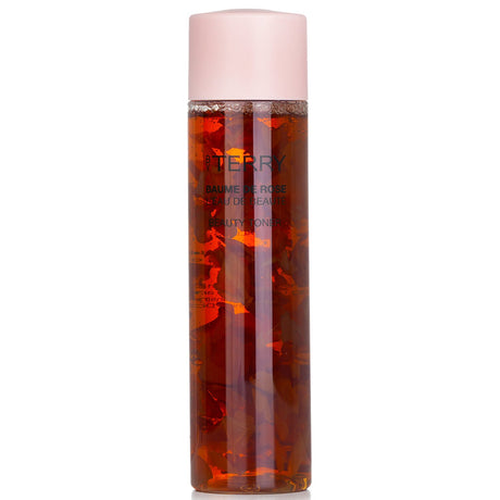 By Terry's Baume De Rose Toner in a 200ml bottle, enriched with rose extracts and rosehip oil for hydrated, glowing skin.