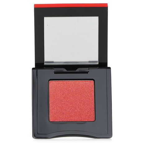 Vibrant Shiseido eyeshadow in #06 Vivivi Orange, featuring a powder-to-gel formula with matte, shimmer, and sparkle finishes.