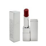 RMK Comfort Airy Shine Lipstick in #12 Candy Apple, featuring a glossy finish, hydrating ingredients, and a fig scent.