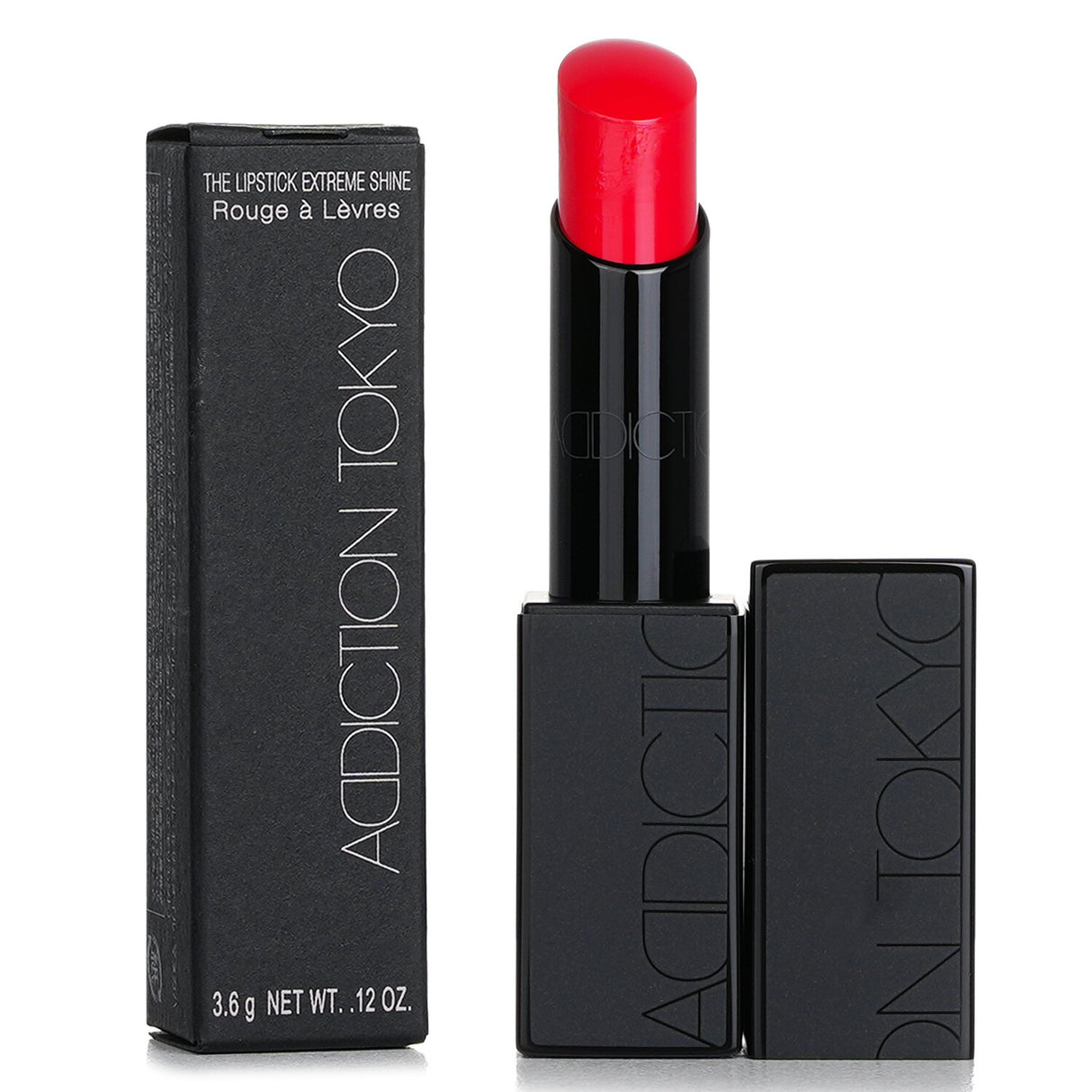 Bright pink lipstick with a creamy texture, offering extreme shine and hydration for a vibrant, elegant pout.