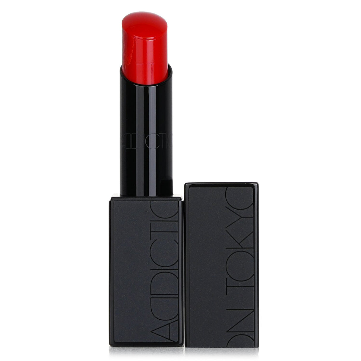 Luxurious ADDICTION Lipstick in #010 Plain Hearts offers creamy texture, rich color, and alluring shine for a dewy pout.