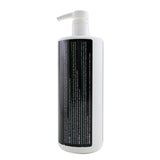 Energizing Tea Tree Conditioner for men, enhancing hair volume, shine, and scalp health, with refreshing scent.