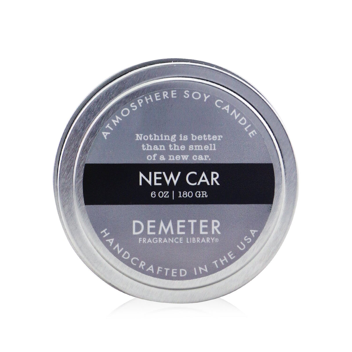 Luxurious soy candle with a New Car scent, evoking fresh interiors; handcrafted in the USA for a clean, long-lasting burn.