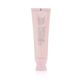 Oribe Serene Scalp Exfoliating Scrub in 125ml, revitalizes and purifies scalp with exfoliants and soothing ingredients.