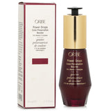 Oribe Power Drops Color Preservation Booster in a 30ml bottle, infused with 2% Vitamin C for vibrant, protected color-treated hair.