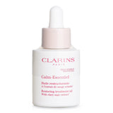 Calm-Essentiel Restoring Treatment Oil by Clarins in a 30ml bottle for soothing and nourishing sensitive skin.