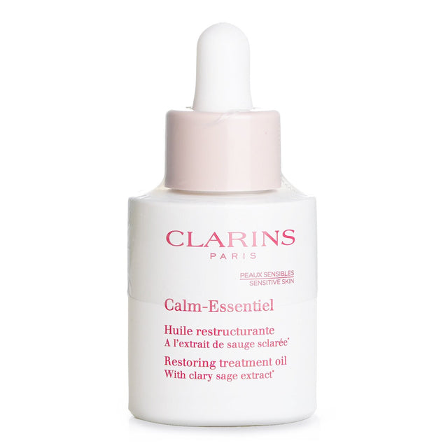 Calm-Essentiel Restoring Treatment Oil by Clarins in a 30ml bottle for soothing and nourishing sensitive skin.