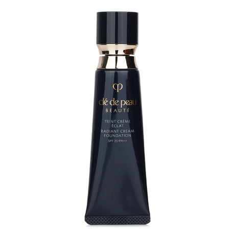 Luxurious Cle De Peau Radiant Cream Foundation N SPF 25 in # O10 Light Ocher, offering flawless, radiant coverage and UV protection.