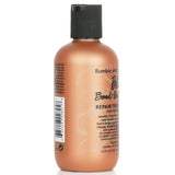 Bumble and Bumble Bond-Building Repair Treatment in a 125ml bottle, designed to repair and strengthen damaged hair.