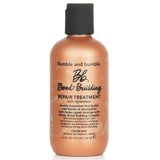 Bumble and Bumble hair treatment in 125ml bottle, designed to repair damage and hydrate all hair types with Honey Bond Complex.