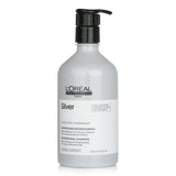 L'Oreal Professionnel Silver Violet Shampoo: purple formula neutralizing yellow tones for radiant grey, white, and blonde hair.