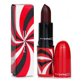 MAC Magic Charmer Lipstick from the Hypnotizing Holiday Collection, a bold matte shade with nourishing Vitamins E and C.