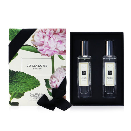 Elegant Jo Malone cologne duo featuring Peony & Blush Suede and Wood Sage & Sea Salt, perfect for gifting or personal use.