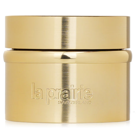 Luxurious La Prairie Pure Gold Radiance Eye Cream in a sleek container, designed to brighten and rejuvenate the delicate eye area.