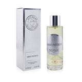 Luxury room spray Ambre Precieux by Nicolai, 100ml, adds warmth and elegance to your space with its sensuous fragrance.