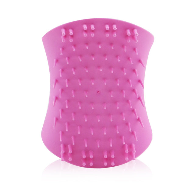 Scalp exfoliator brush in Pretty Pink, designed for detoxifying and massaging scalp health with dual teeth and winged grip.