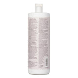 Paul Mitchell Clean Beauty Repair Conditioner in a 1000ml bottle, designed for damaged hair with vegan, natural ingredients.