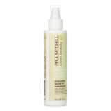 Lightweight leave-in treatment with argan oil and aloe vera for hydrated, shiny hair; suitable for all hair types.