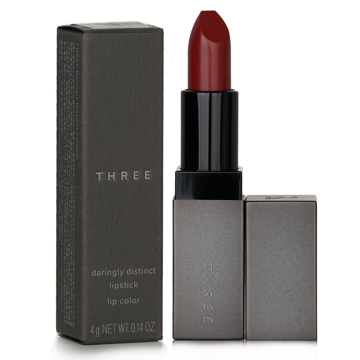 Luxurious THREE lipstick in #10 Inner City offers vibrant, long-lasting color with a lightweight, hydrating formula for a luminous pout.