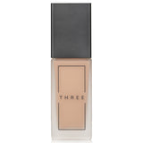 Fluid foundation in shade #203 with SPF 40, offering smooth coverage and a radiant finish while minimizing pores.