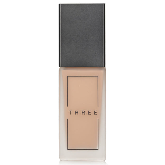 Fluid foundation in shade #203 with SPF 40, offering smooth coverage and a radiant finish while minimizing pores.