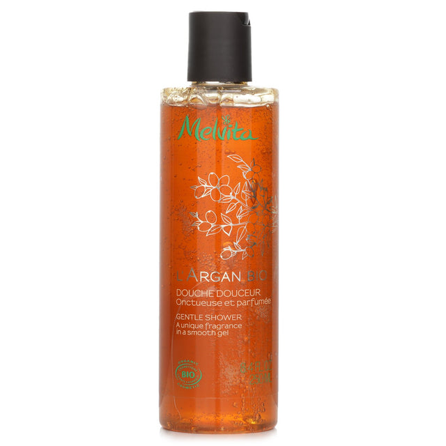 Melvita L'Argan Bio Gentle Shower gel, 250ml, featuring a floral woody scent, 99% natural, and suitable for all skin types.