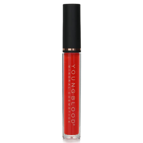 Youngblood Lipgloss in Guava offers a shiny, non-tacky formula that enhances lips with a moisture-binding, radiant hue.