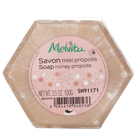 Melvita Honey Propolis Soap, 100g, gently nourishes all skin types with natural honey and propolis for soft, hydrated skin.
