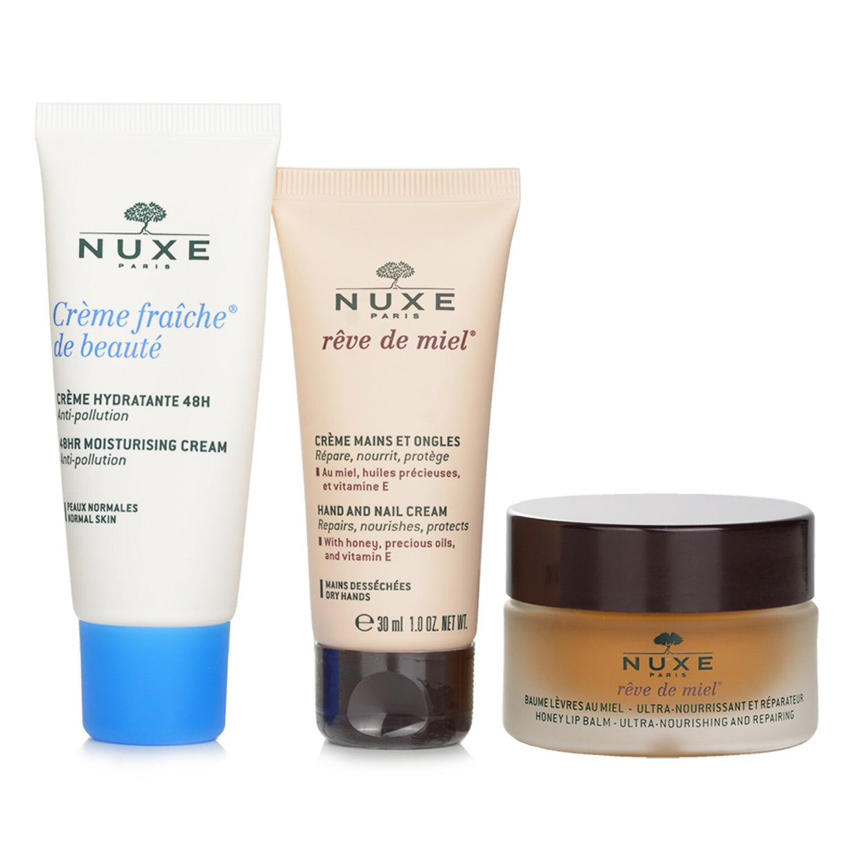 Nuxe Moisture Me Kit with 48Hr Moisturising Cream, Honey Lip Balm, and Hand & Nail Cream for ultimate hydration.