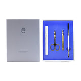 Eyeko Brow Grooming Kit featuring a brush, spoolie, scissors, tweezers, and razor for perfect eyebrow shaping and maintenance.