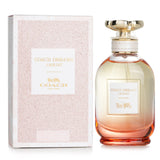 Coach Dreams Sunset Eau De Parfum Spray in a 60ml bottle, featuring floral woody notes of pear, jasmine, and vanilla.