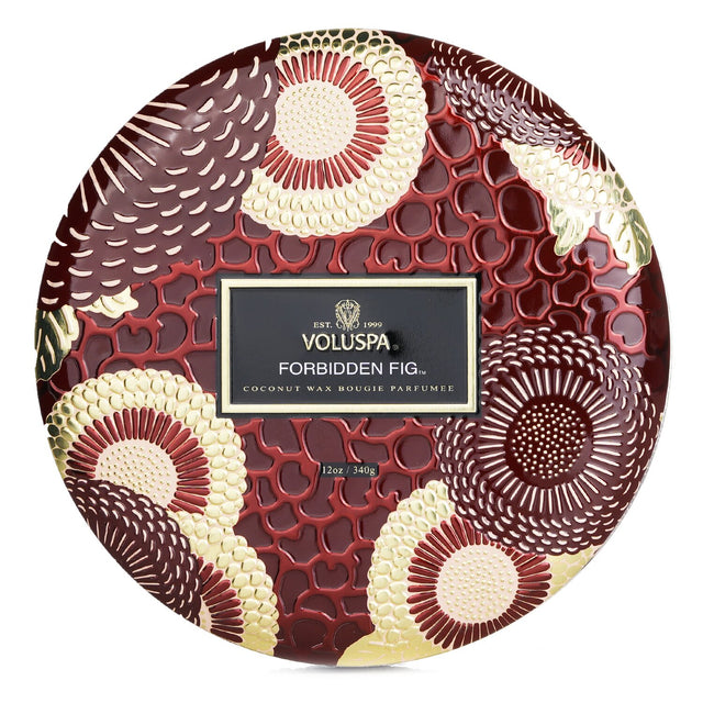 "Voluspa Forbidden Fig candle in decorative tin, featuring a rich fig fragrance, three wicks, and a luxurious design."