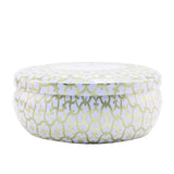 Voluspa 3 Wick Candle in decorative tin, eucalyptus and white sage fragrance, providing 40 hours of soothing ambiance.