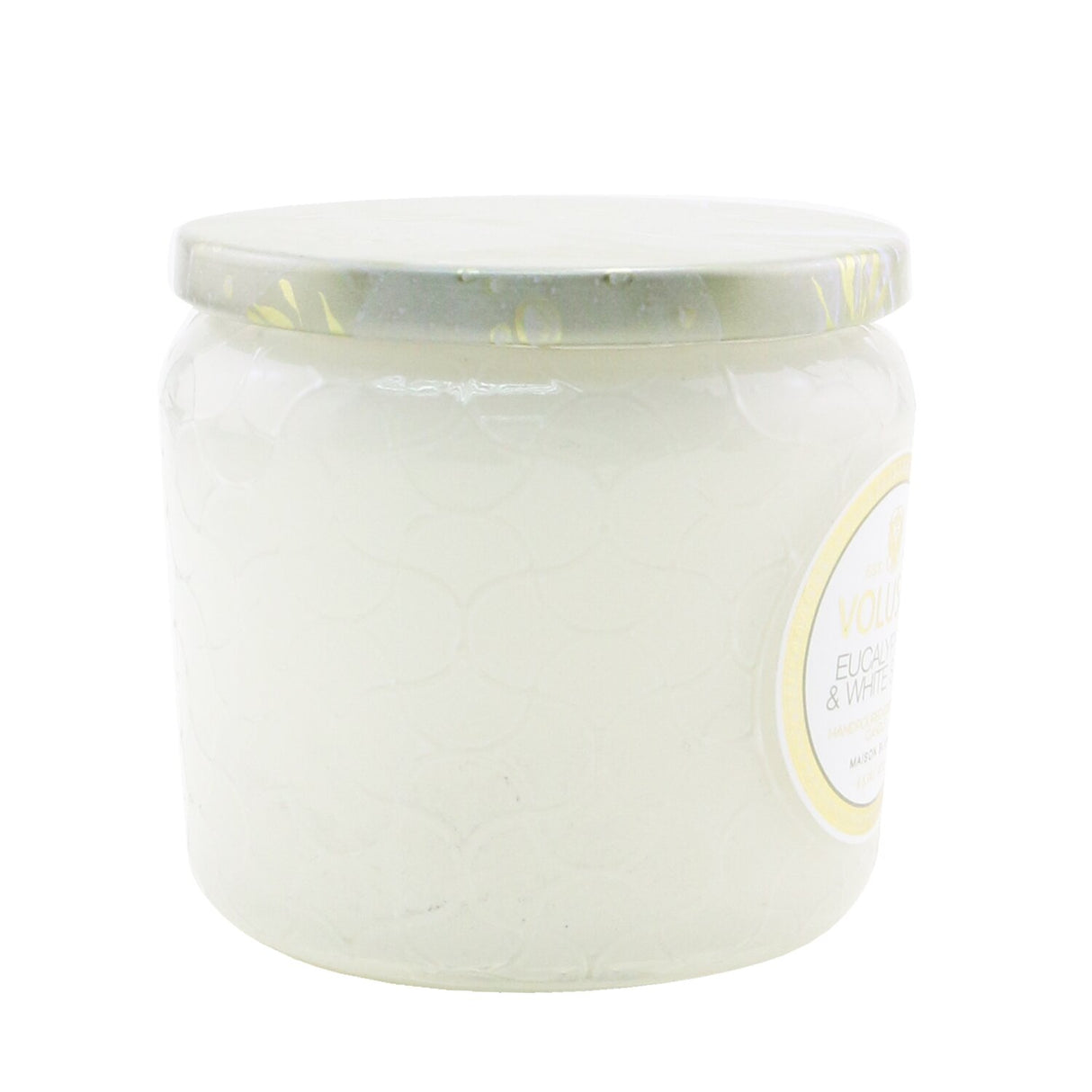 A luxurious petite jar candle featuring eucalyptus and white sage scent, in a decorative glass container with a lid.