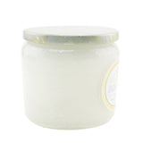 A luxurious petite jar candle featuring eucalyptus and white sage scent, in a decorative glass container with a lid.