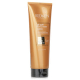 Redken All Soft Heavy Cream Treatment in 250ml, enriched with Silk-Luxe Complex, for deep moisture and shine in dry hair.