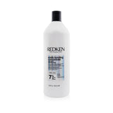 Redken Acidic Bonding Concentrate Shampoo in salon size, designed for demanding processed hair, enhances strength and repair.