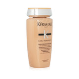 Kerastase Curl Manifesto creamy shampoo for curly hair, enriched with Manuka Honey and Ceramide for hydration and curl definition.