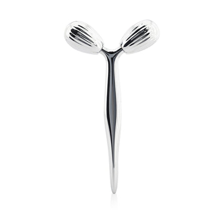 Payot face revitalizing roller in zinc for skincare, boosting elasticity and relaxing facial muscles. Ideal for morning and evening use.