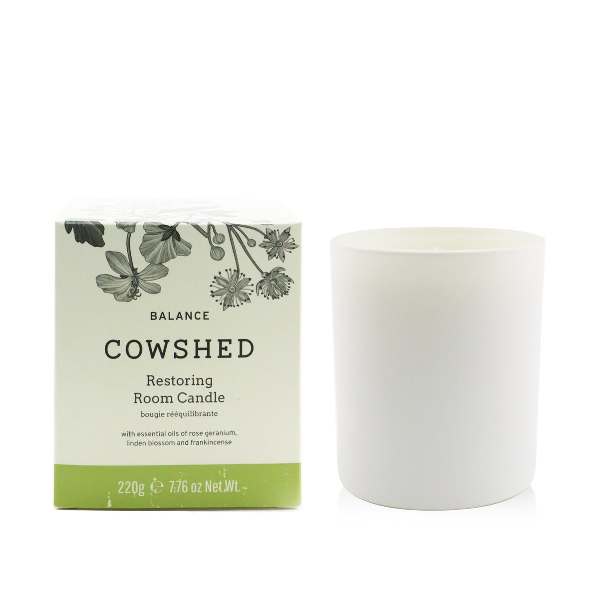 Cowshed Balance Candle (220g) with floral scents of rose geranium, linden blossom, and frankincense for a serene ambiance.