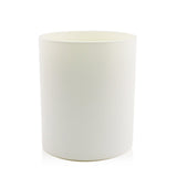 Cowshed Active Candle, 220g, features uplifting lemongrass, ginger, and rosemary scents, made from natural soy wax for a clean burn.