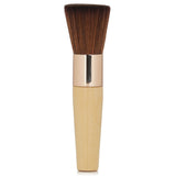 Luxurious rose gold Handi Brush with soft goat hair, perfect for applying base and powders for a flawless finish.