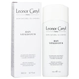Fortifying shampoo for fine, color-treated hair, enriched with organic jojoba oil and chamomile, ensures soft, bouncy, nourished locks.