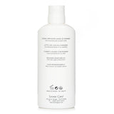 Leonor Greyl Lait Lavant A La Banane: vegan daily shampoo with banana and hibiscus, gentle cleansing for soft, shiny hair.