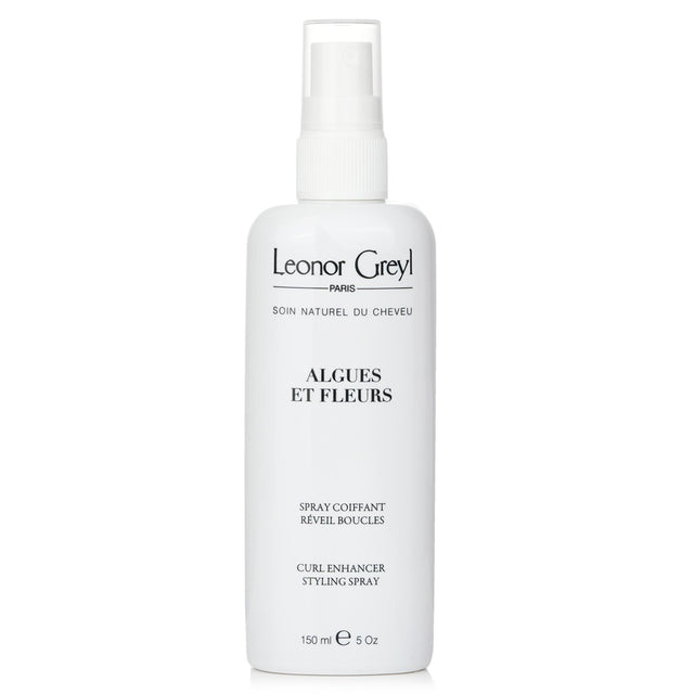 Leave-in styling spray for curly hair, infused with seaweed and flower extracts for hydration and bounce.