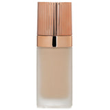 Charlotte Tilbury Airbrush Flawless Foundation #1 Neutral, a weightless, full-coverage formula for a youthful, flawless finish.