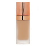 Airbrush Flawless Foundation #3 Cool by Charlotte Tilbury offers full coverage, hydration, and anti-aging benefits for a flawless finish.