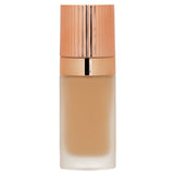 Charlotte Tilbury Airbrush Flawless Foundation #5 Neutral in 30ml offers sweat-proof, full-coverage for a flawless matte finish.